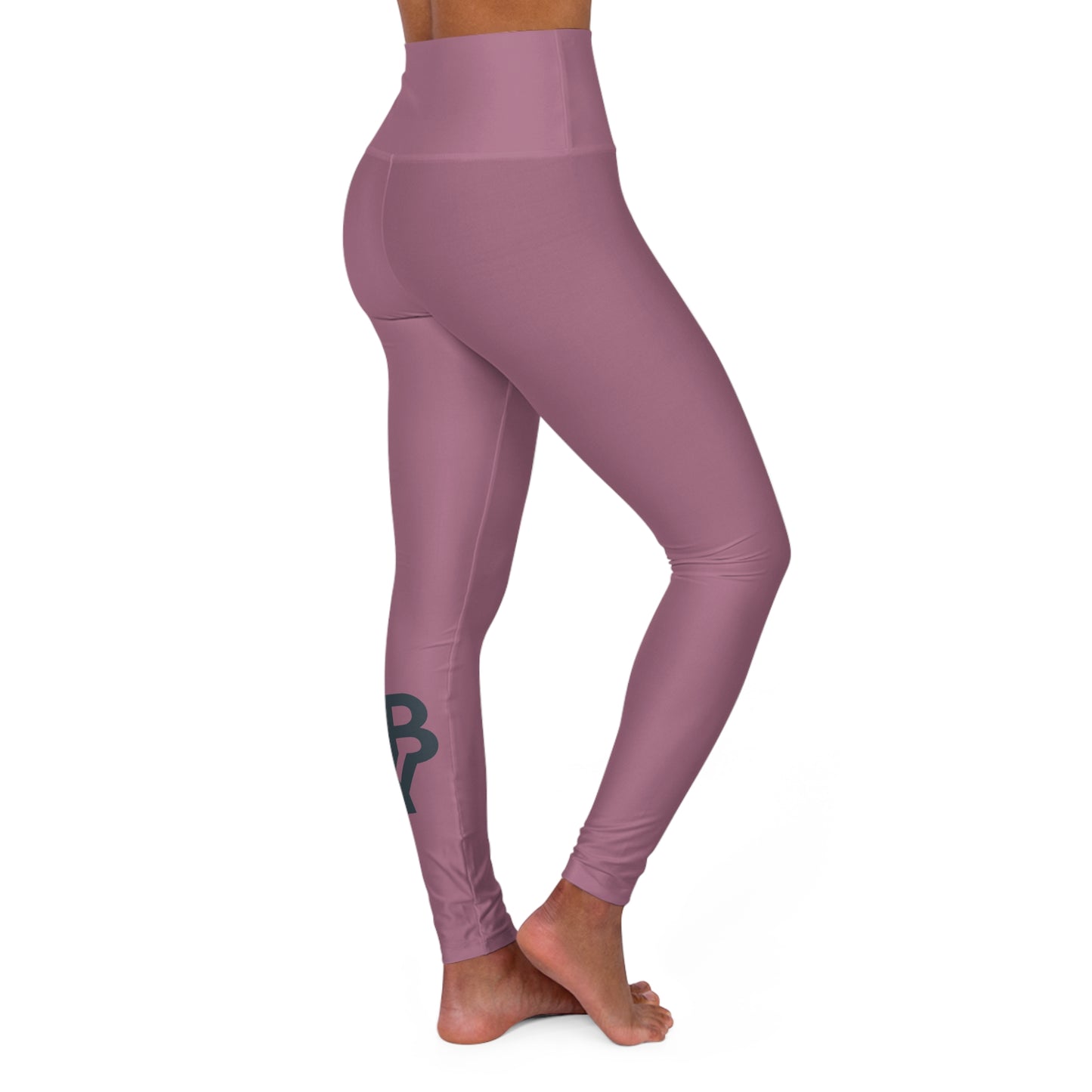 Find your rhythm in this muted mauve moment. With a sleek charcoal logo at the calf, these leggings are the balance between bold and refined. Because strength doesn’t need to shout — it just needs to show up.