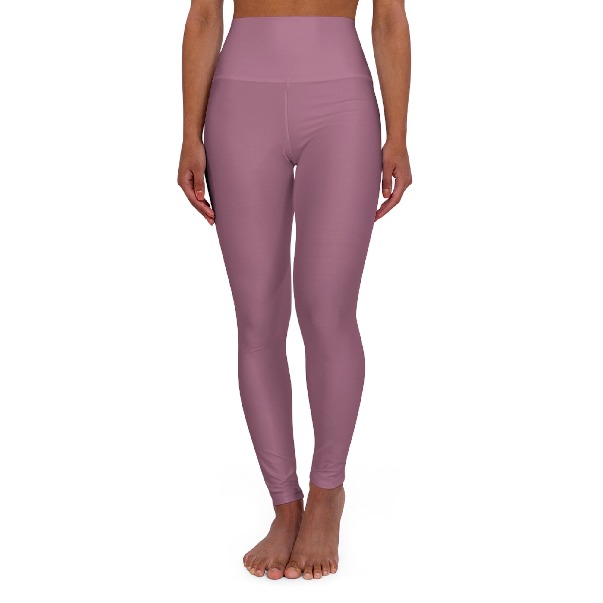 Find your rhythm in this muted mauve moment. With a sleek charcoal logo at the calf, these leggings are the balance between bold and refined. Because strength doesn’t need to shout — it just needs to show up.